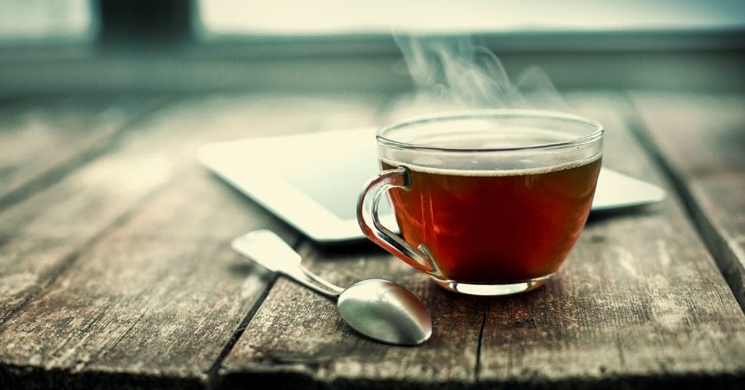 Kopje thee met lepel